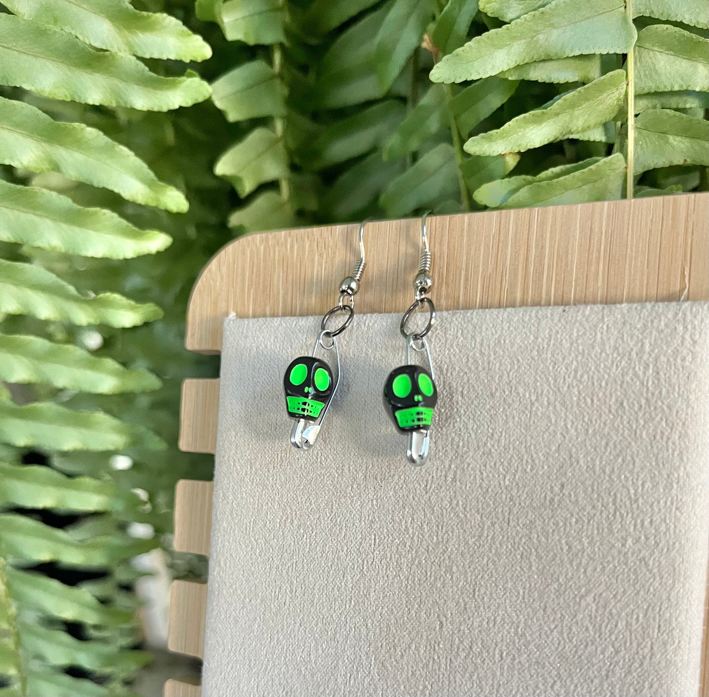 Green & Black Skull Safety Pin Earrings on silver stainless steel hooks