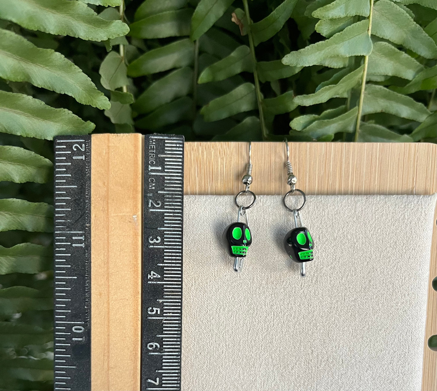 Green & Black Skull Safety Pin Earrings on silver stainless steel hooks