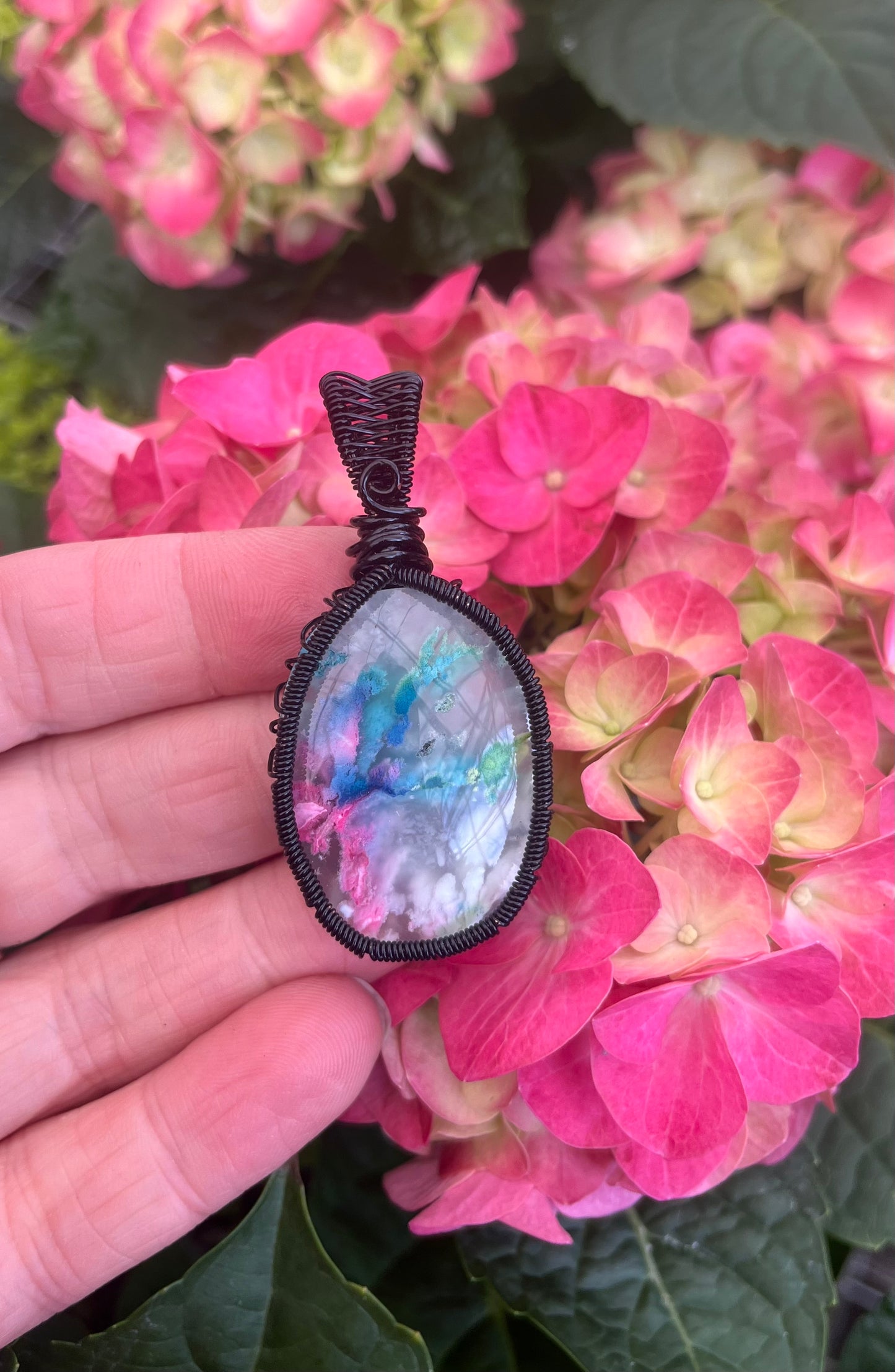 Rainbow Moss Agate Pendant – Black Wire Wrapped Crystal – Handcrafted Nature-Inspired Healing Jewelry