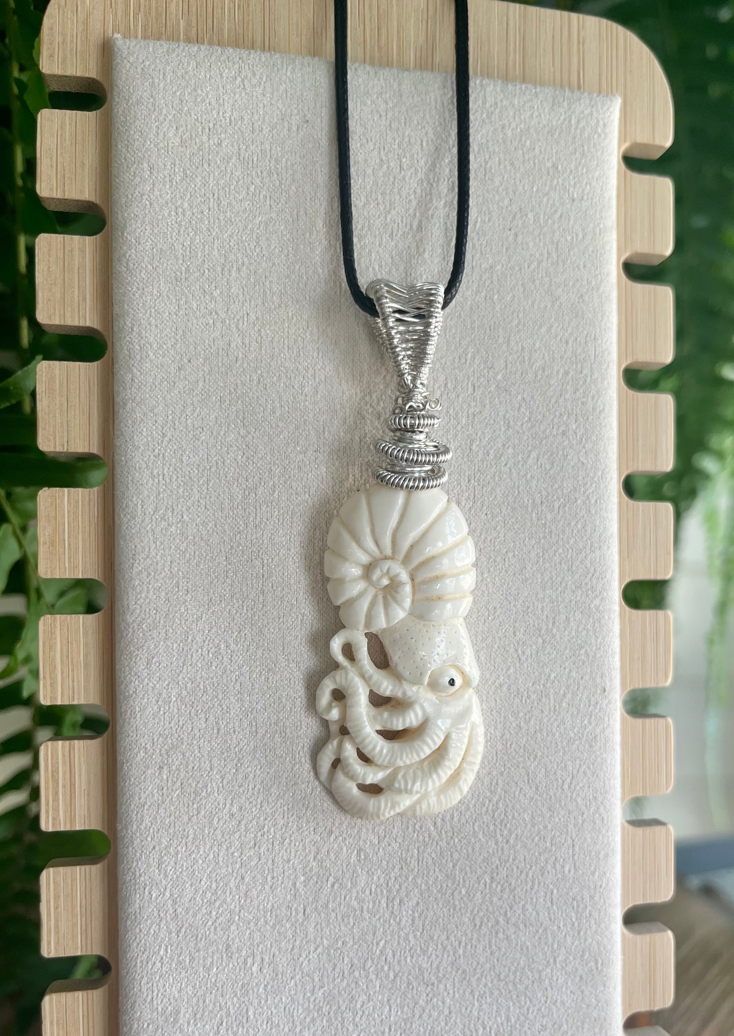 Carved Bone Squid in silver wire, pendant/necklace