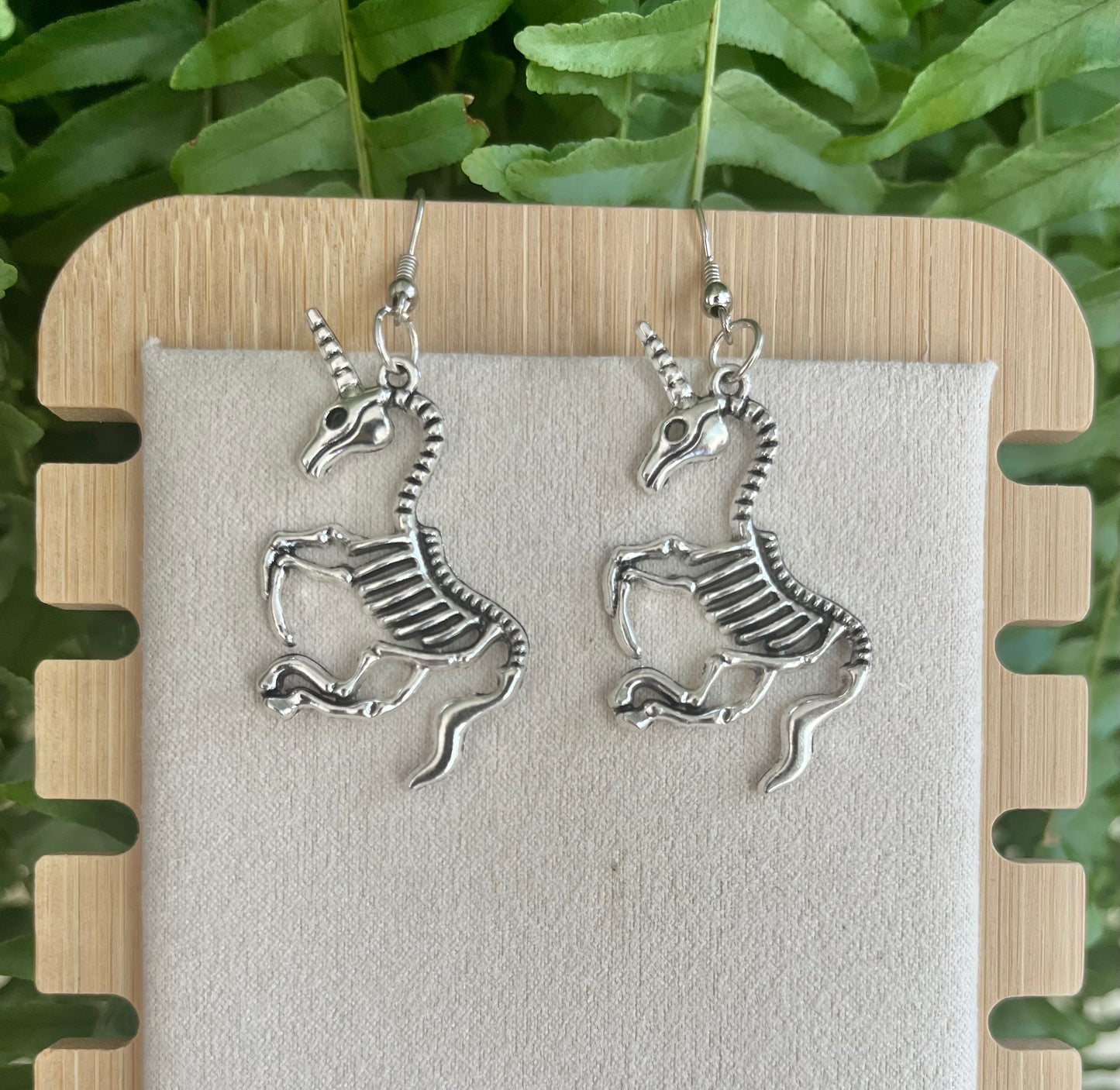 Unicorn Skeleton Earrings on silver stainless steel hooks