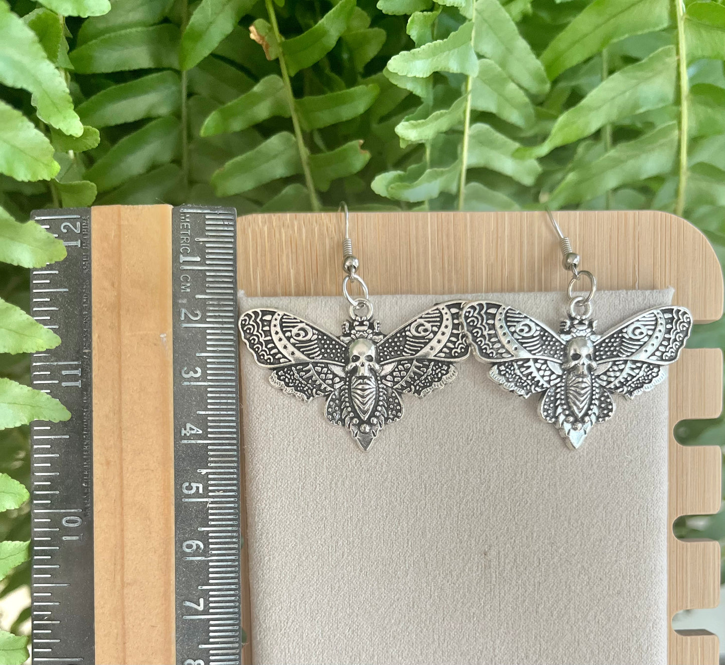 Moth and Skull Earrings on silver stainless steel hooks