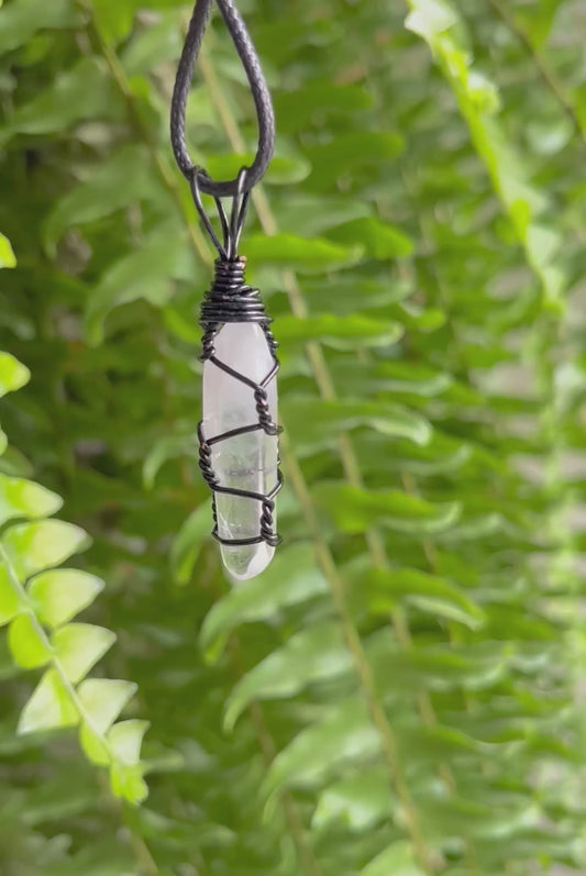 Clear Quartz in black wire, pendant / necklace